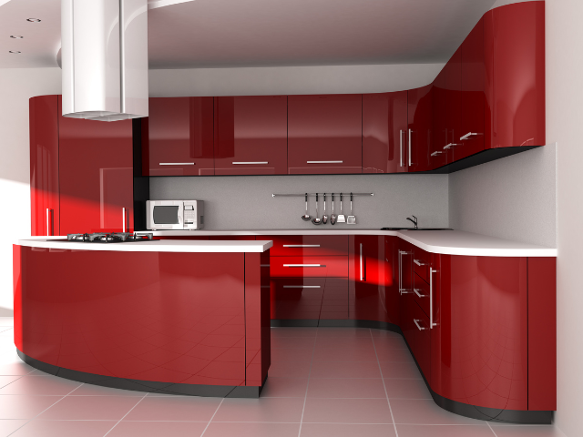 A sleek, vibrant red kitchen with glossy cabinetry and a curved counter.