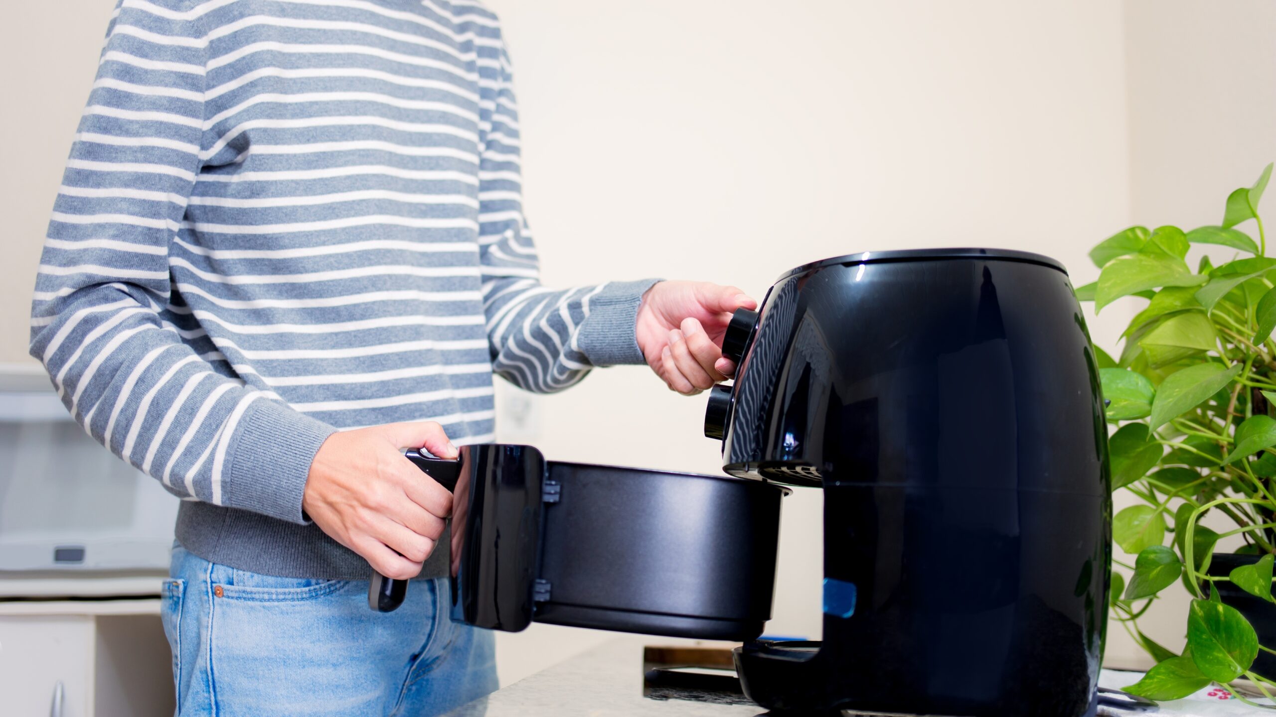 inserting an air fryer